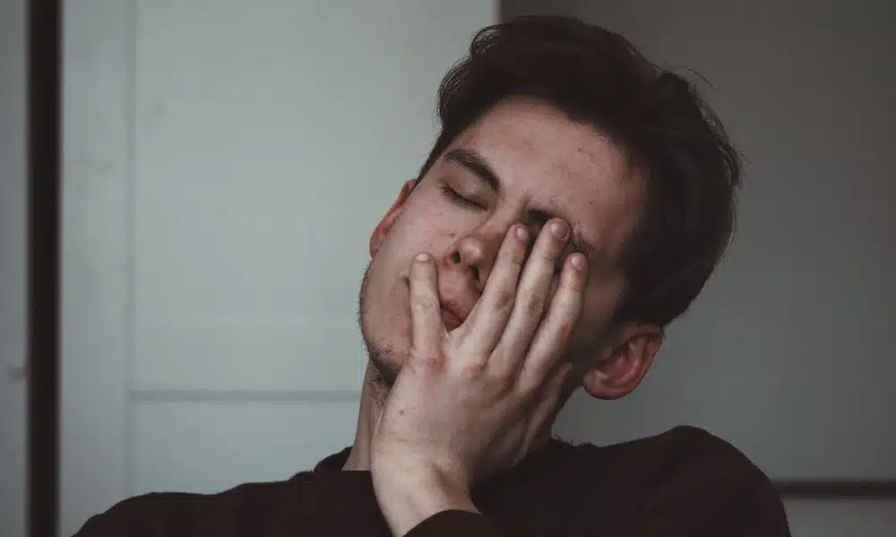 man wearing black crew-neck top