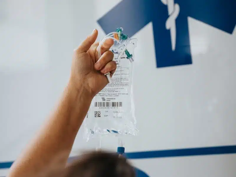 person holding white printer paper